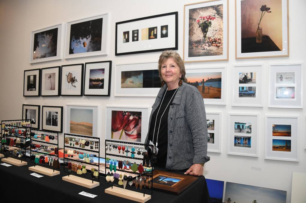 Artist and teacher Jude Morrell with her jewellery creations and prints. Picture by Amy McIntyre