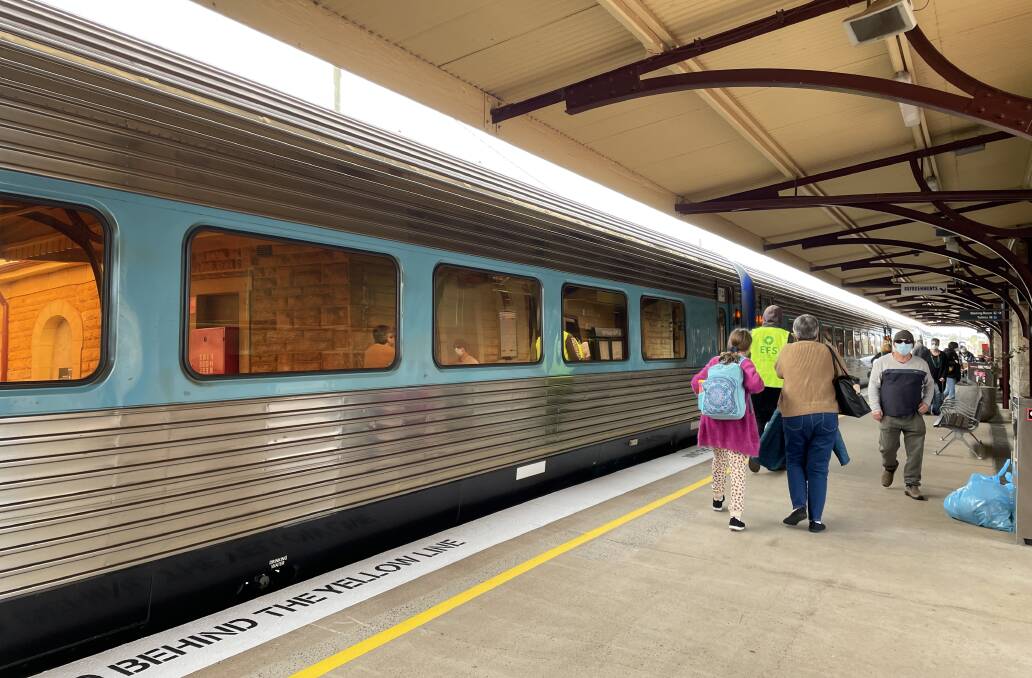 Train commuters at Dubbo wear facemask which is mandatory on all trains as part of the COVID-19 public health order. Picture: Elizabeth Frias