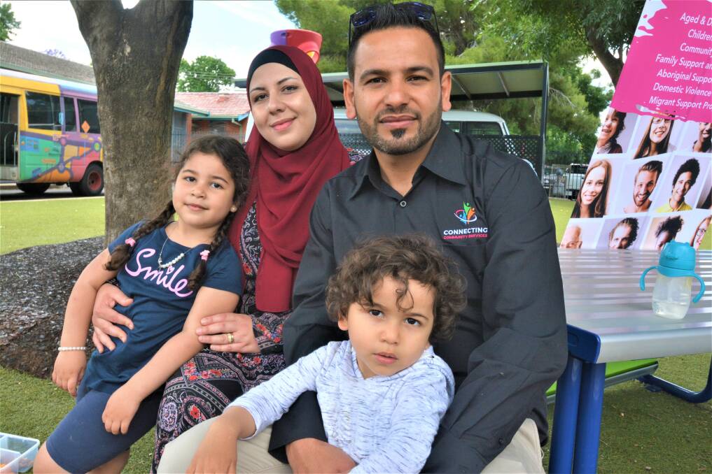 Connecting Communities Centre migrant support worker Khaled Taleb and his wife, Salam Farachi and their children. Picture by Elizabeth Frias