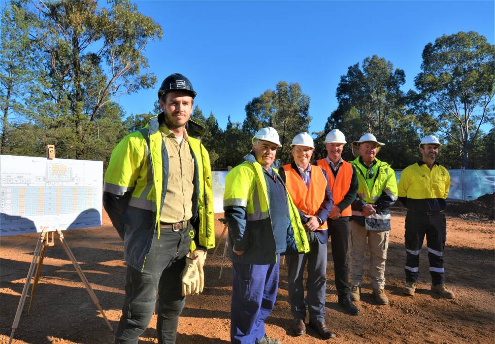 David Payne Constructions crew building the conservation centre with Dubbo MP and agriculture minister Dugald Saunders and TWPZ director Steve Hinks (3rd and 4th from left). Picture: Elizabeth Frias