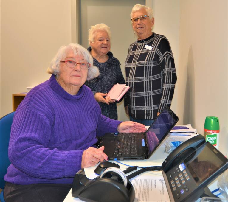 Barb O'Brien OAM, Pat Thornton and Barb Kelly run the St Vinnie's office on Macquarie St, Dubbo. Picture: Elizabeth Frias