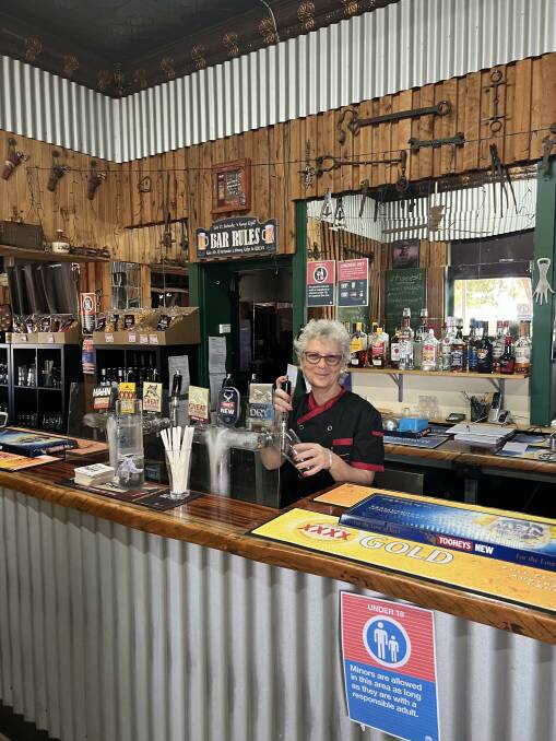 Gilgandra Railway Hotel publican Donna Sant at the bar getting ready for the New Year's Eve party. Picture Supplied