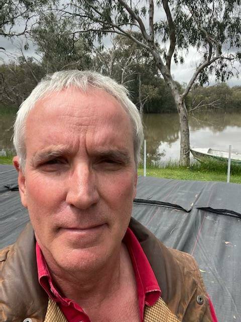 Farmer Richard Bootle shows the levee they built along the Macquarie River bordering their Claremont property. Picture Supplied