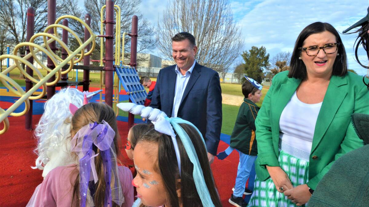 Teachers, parents and students and the school principal Toby Morgan joined visiting education minister Sarah Mitchell and Dubbo MP Dugald Saunders on the day the children and teachers dressed up in their favorite book characters. Picture: Elizabeth Frias 