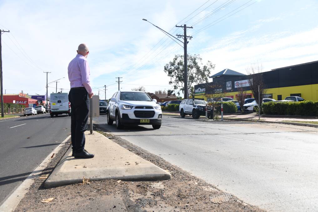 MORE PEDESTRIAN CROSSINGS: A man waits to cross a roundabout on Erskine Street in the central business district. Picture: AMY MCINTYRE