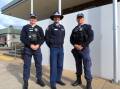 Superintendent Danny Sullivan, Orana Mid-Western Police District Commander, centre, stands with new recruits Braden Coleman, left, and Matthew Willetts outside Dubbo Police Station. Picture: Bageshri Savyasachi
