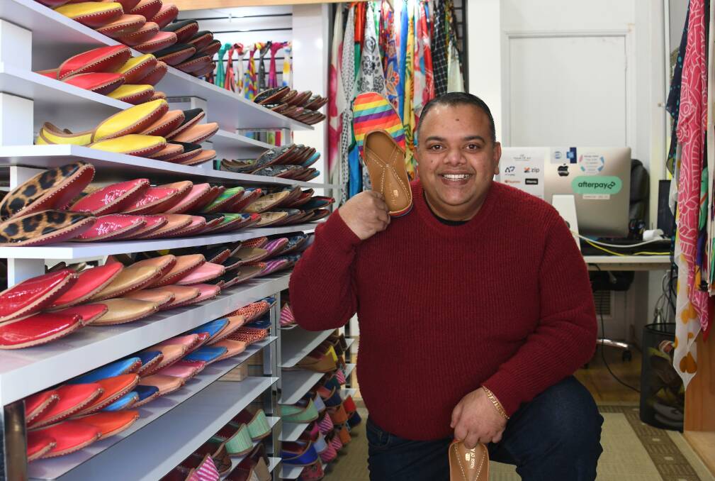House of Avi owner, Avi Kumar, shows off his collection of juttis. Picture: Amy McIntyre