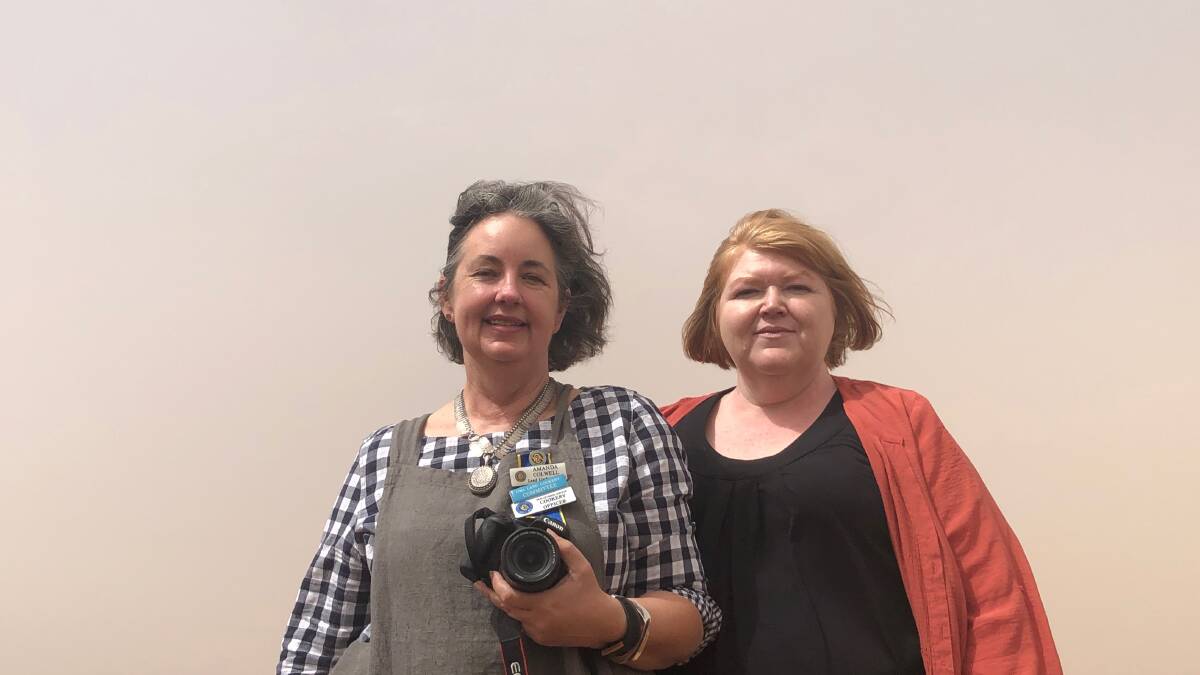 CELEBRATING RESCILIENCE: Country Womens Association Coonamble Evening Branch members Amanda Colwell and Raquel Pickering braved the dust to capture some snaps to promote the Grit and Grace award and exhibition dinner