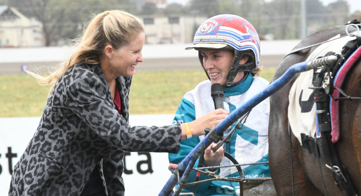 TOO GOOD: Mel Setree interviews Amanda Turnbull after winning race the Banjo Patterson Cup with Atomic Red. Photo: CHRIS SEABROOK
