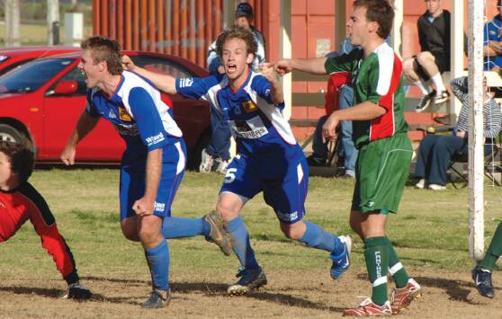 RETURN: Adam Collins and Mitch Housler celebrate a goal in the 2008 WPL grand final. The Bathurst club could be back in the WPL in 2022. 