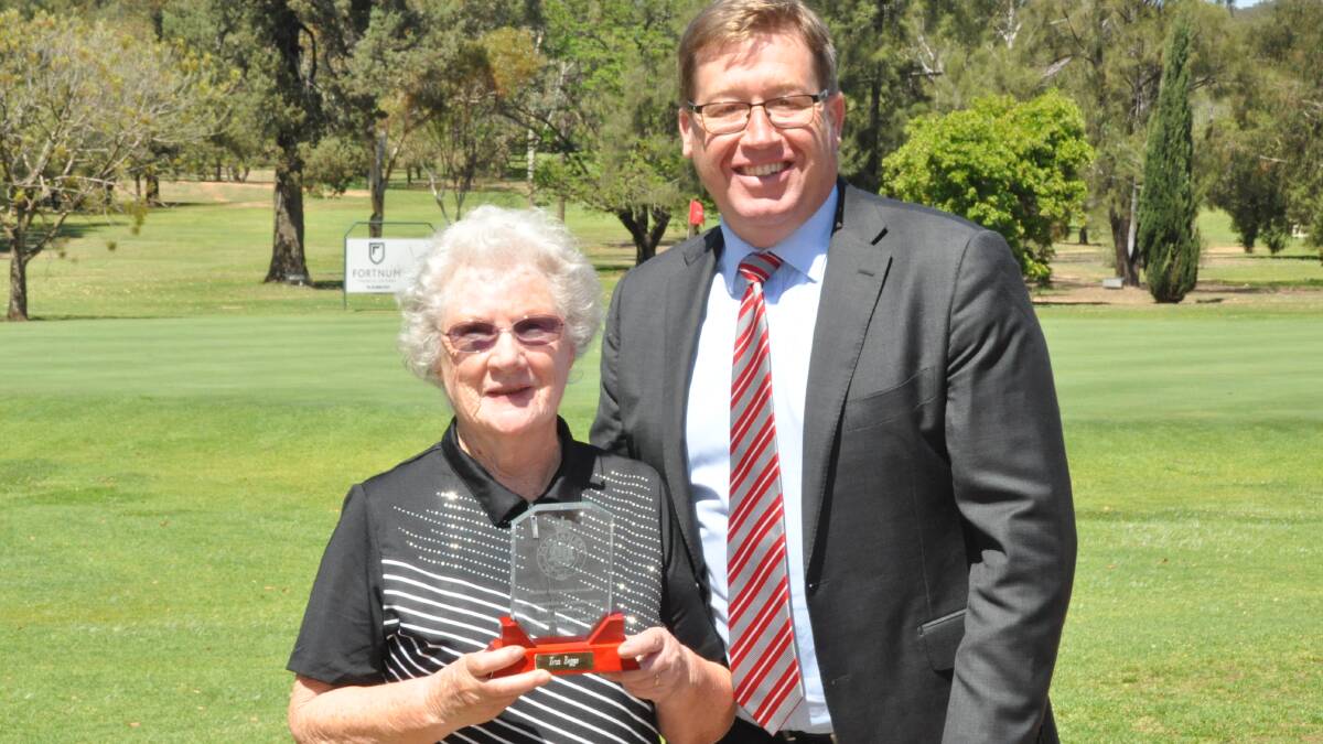 Well Done: Electorate award winner Tina Beggs was presented with her award by Dubbo MP Troy Grant at Dubbo Golf Club on Monday.