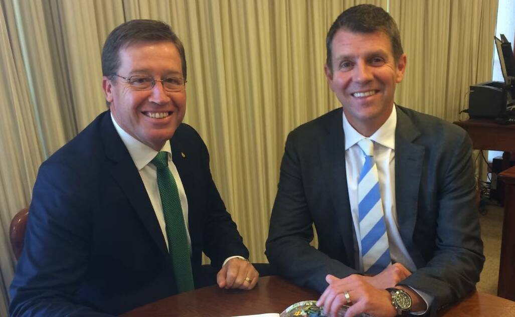 UNITED FRONT: NSW Deputy Premier Troy Grant with premier Mike Baird. Their government has moved to ban greyhound racing in the state. Photo: DAILY LIBERAL