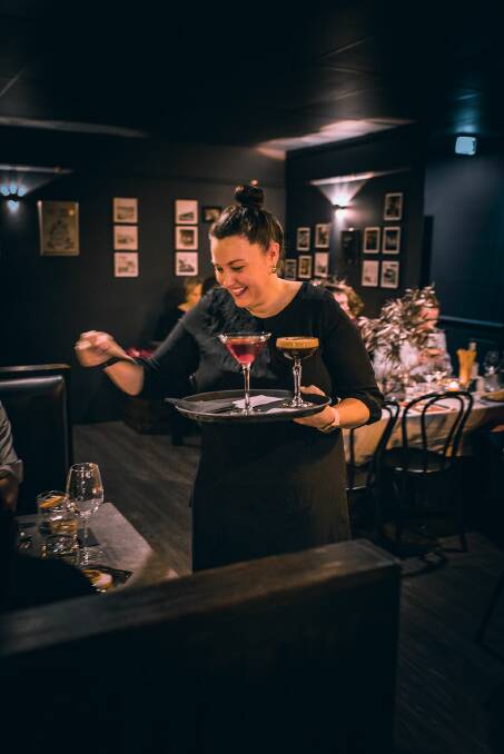 Director Tenelle Bond happily serving cocktails. Picture: Supplied 