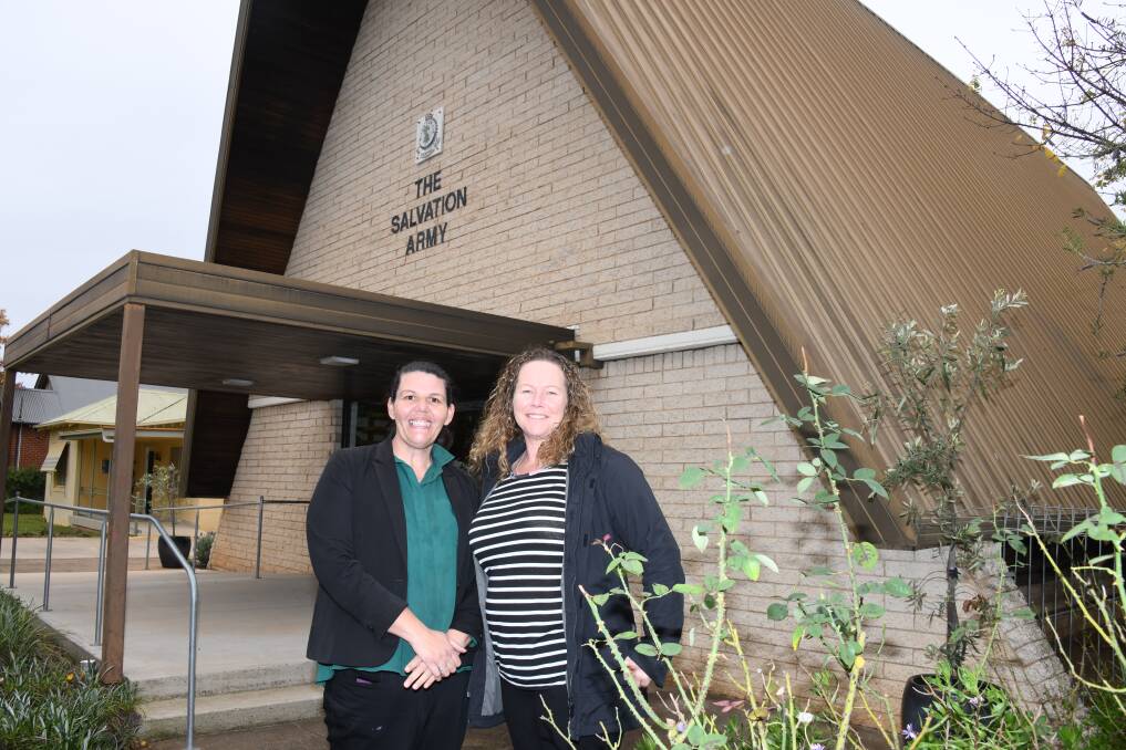 Kellie Williams and Kelly Salisbury stand in front of the Orana Salvation Army building. Picture: Amy McIntyre. 