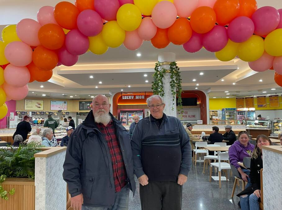 Ian Rindfleish and Ron Taylor standing at the newly renovated food court in Dubbo Square. Picture: Ciara Bastow 