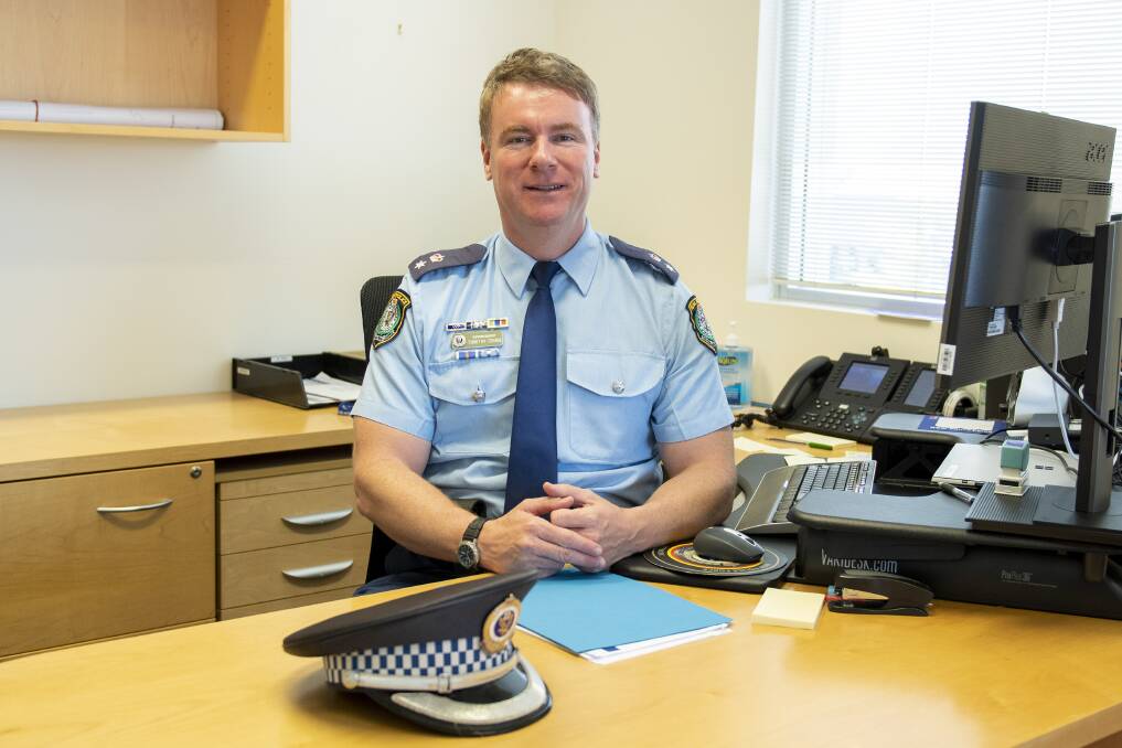 Orana Mid-Western police commander Timothy Chinn at his desk. Picture by Belinda Soole 