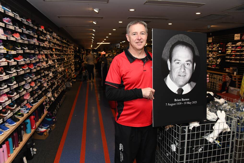 Anthony Barnes stands with a picture of his late father Brian Barnes in 'Brian Barnes Sportspower'. Picture by Amy McIntyre 