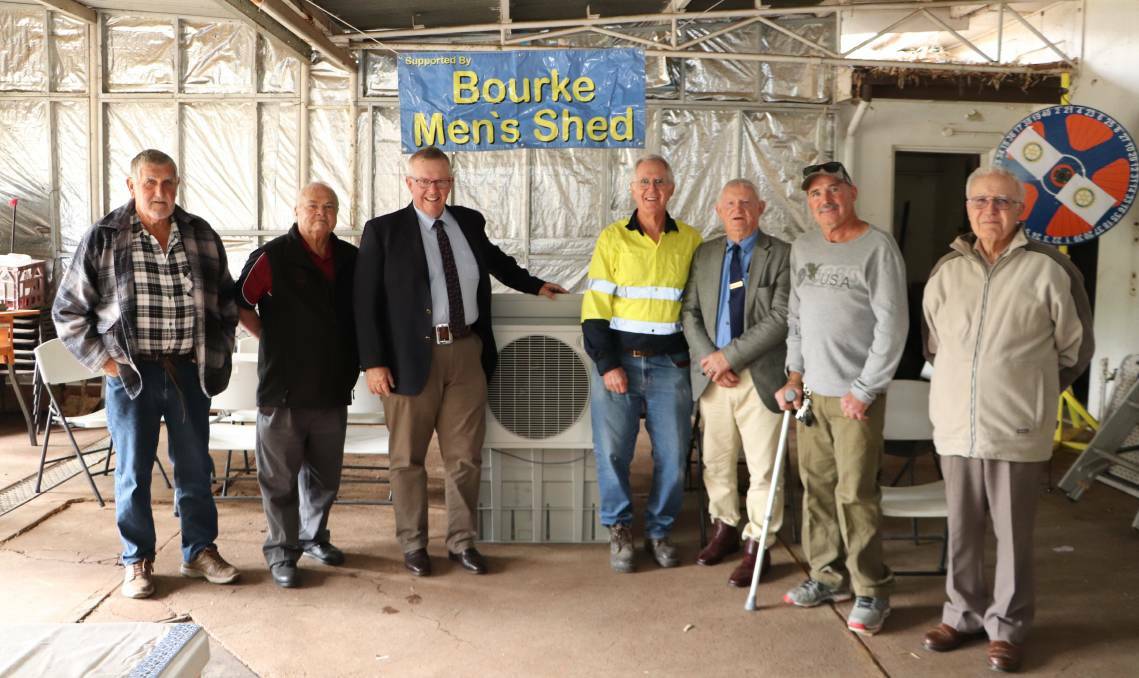 Federal Member for Parkes Mark Coulton (third from left) met with members of the Bourke Mens Shed, including president Robert Stutsel (centre) and Bourke Mayor Barry Hollman (third from right). Picture supplied 