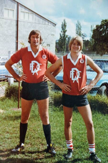 REMEMBERED: Peter Woods with his son back in the Dubbo Demons early days. Photo: Contributed. 