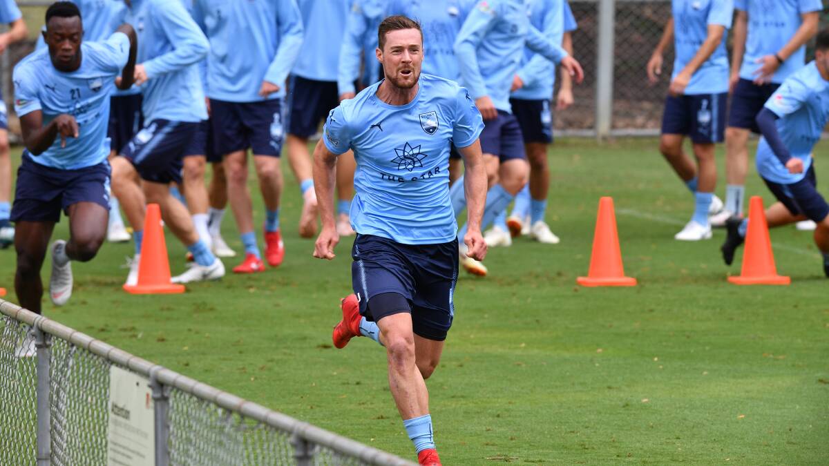 Sydney FC player Jacob Tratt (centre) is seen during a team training session in Sydney, Thursday, November 29, 2018. (AAP Image/Brendan Esposito).
