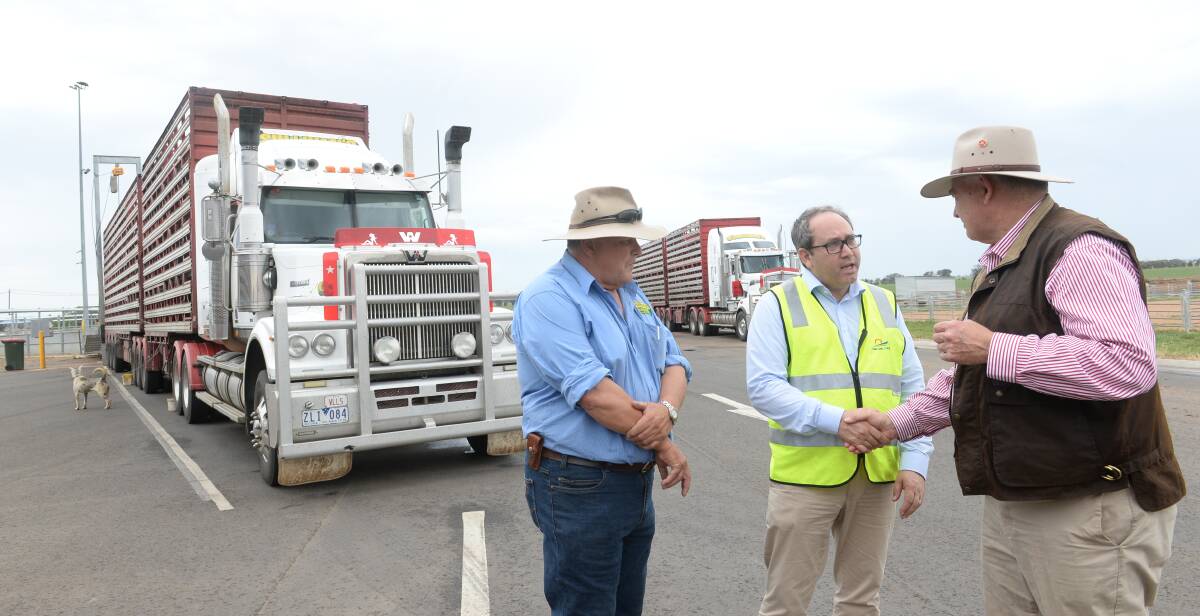 Cootamundra Saleyards Manager and Australian Saleyards Managers Association president, Jeff White, National Heavy Vehicle Regulator chief executive Sal Petrocitto and Forbes Shire Council general manager Steve Loane during an NHVR tour of Forbes saleyards last year.