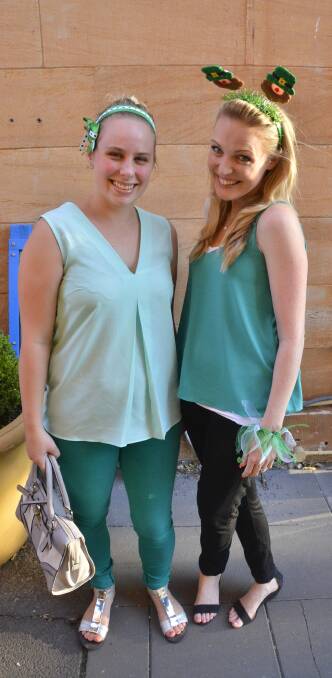 Getting into the festivities wearing head to toe green were Katrina McAulife and Lisa Reng. 