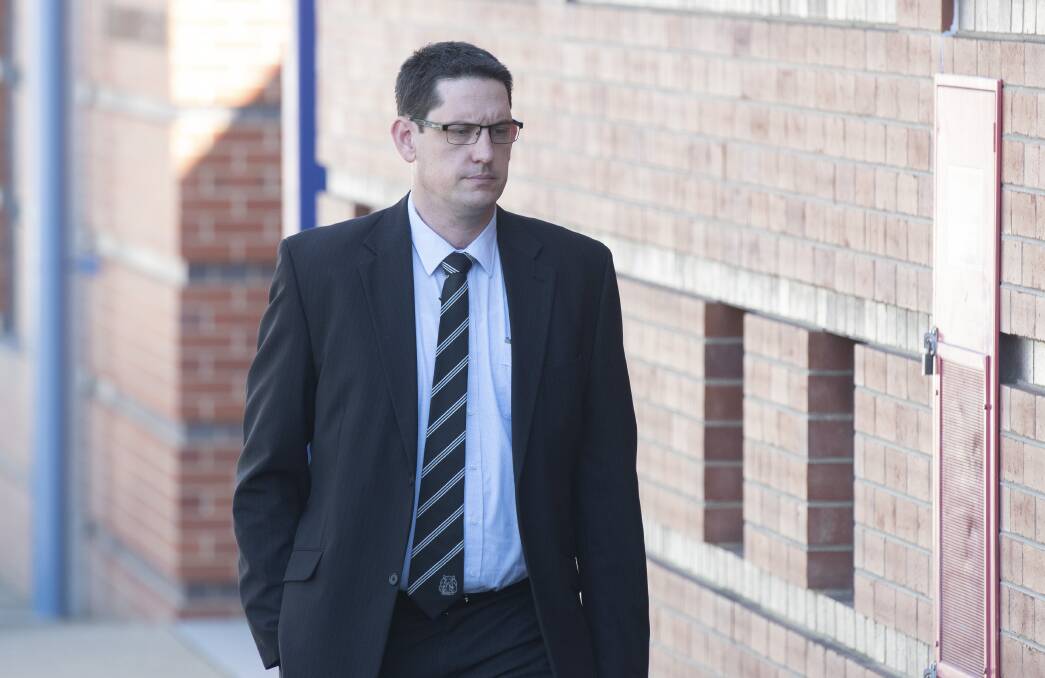 Inquest begins: Critical incident investigator Detective Sergeant Jason Ronczka outside court in Tamworth on Monday. Photo: Peter Hardin