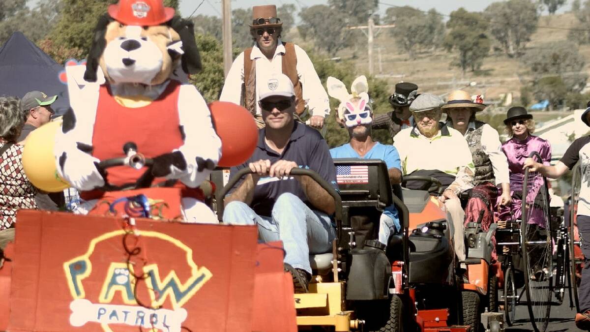 POETRY IN MOTION: A ride-on mower parade is just part of the fun planned for the Man from Ironbark Festival in Stuart Town on Easter Saturday. Photo: FILE.