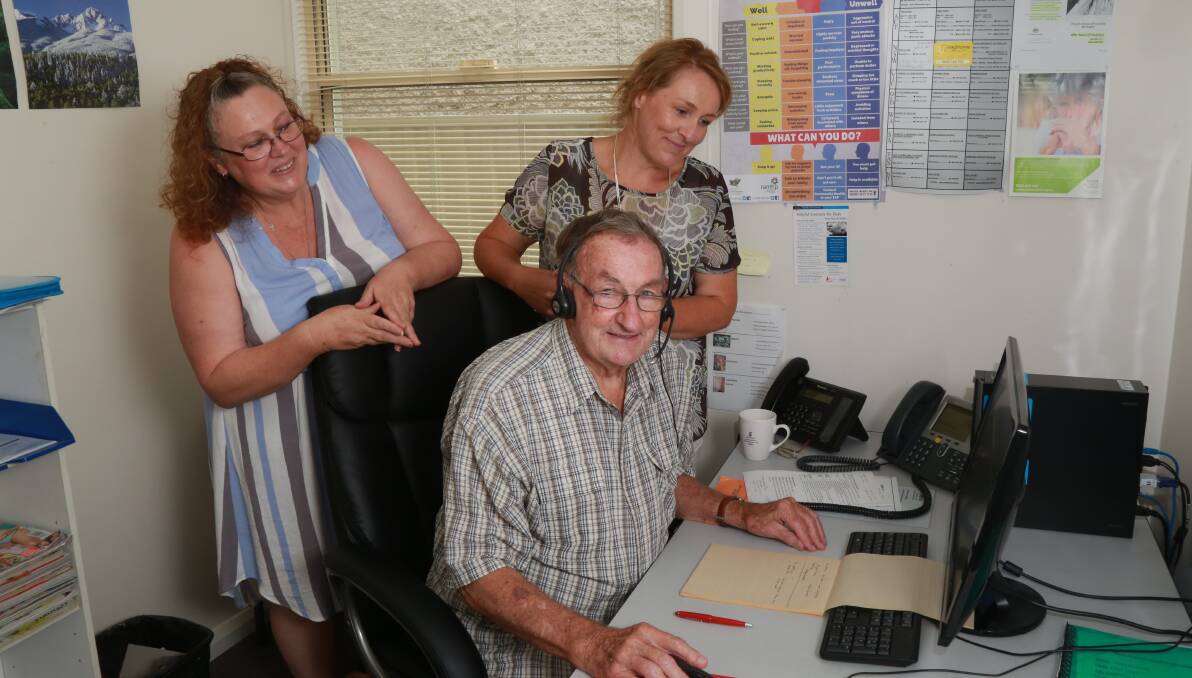 CALL ME: Lifeline volunteers Belinda Quinn and Ray Talbot, pictured with crisis support services manager Stephanie Robinson. Photo: Phil Blatch.