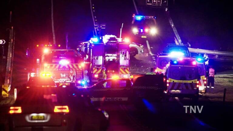 SCENE: Emergency crews at the accident on Friday night: Photo: TROY PEARSON/TNV