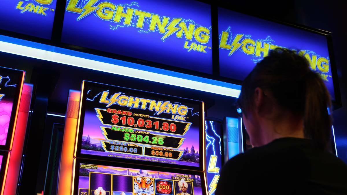 PLAYING TO WIN: Gambling reformers say the pokies are more than a 'dumb box with lights'. Photo: FILE