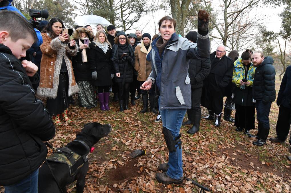 EUREKA MOMENT: Teneka Priestly shows the crowd a truffle found at Borrodell Vineyard on Saturday. Photo: JUDE KEOGH