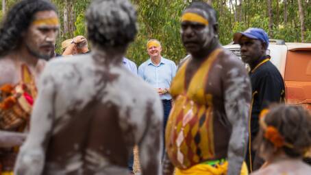 Anthony Albanese watches Yolngu People prepare for the opening ceremony during the Garma Festival at the end of July. Picture: Getty Images
