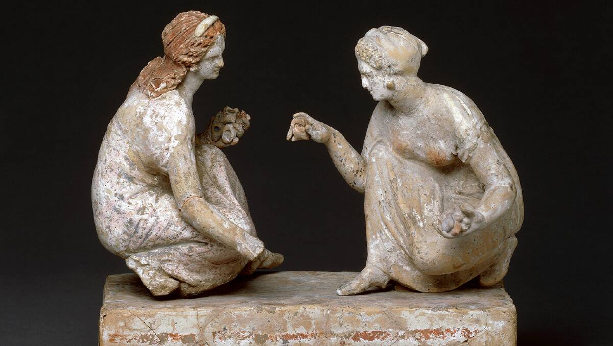Terracotta figurine of women playing knucklebones, circa 330-300 BCE, part of the Ancient Greeks exhibition at the National Museum of Australia from December 17.