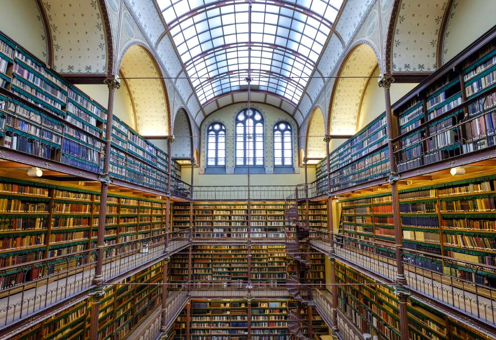 Library of the Rijksmuseum in Amsterdam, with glass roof, arches and galleries full of books. Picture: Shutterstock