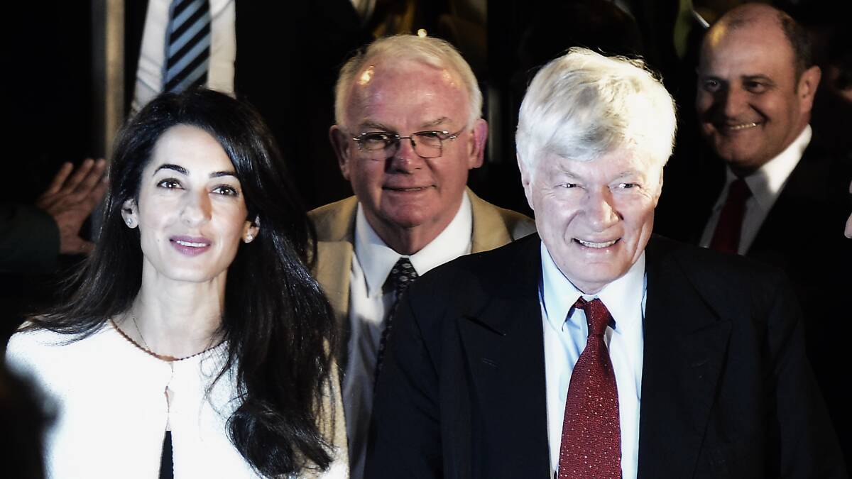 Amal Alamuddin Clooney with archaeologist David Hill and Geoffrey Robertson in Athens in 2014 to advise the government on the return of the Parthenon Marbles. Picture: Getty Images