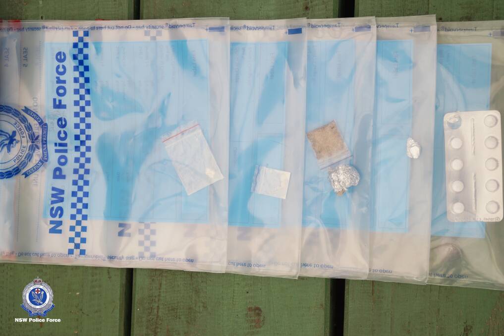 SEARCH: During one of the searches officers located and seized drug paraphernalia and cash. Photo: NSW POLICE