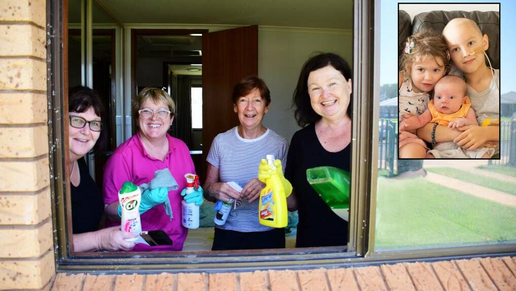 CLEANING: Terri-Ann Kelly, Lyn Griffiths, Barb Taylor and Nettie Williams clean the Ray family's home. Insert: Hannah, Connor and Mitchell Ray in March. Photo: BELINDA SOOLE
