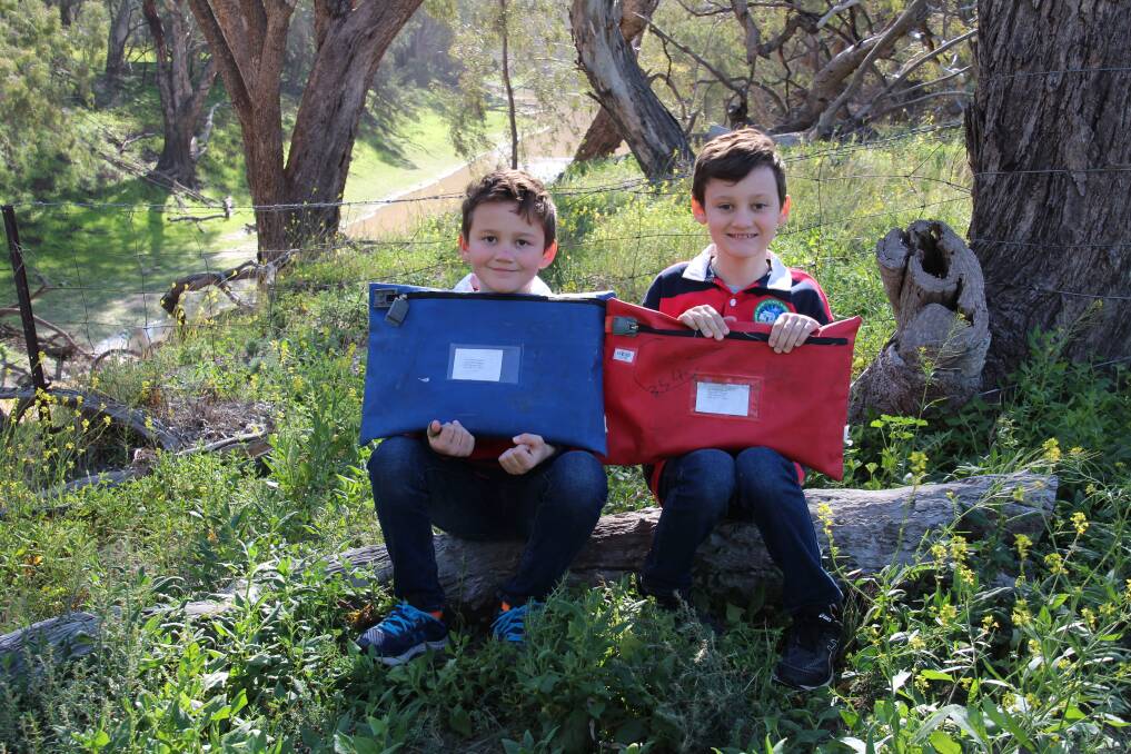 TOP WORK: Rafael Siemer (right), has joined his brother Gabriel (left) as a WriteOn winner. Photo: Jo Coleman Top Wire Photography, Walgett.