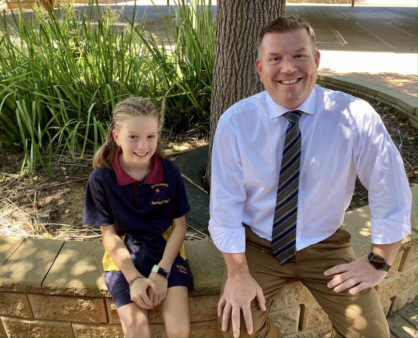 CARD WINNER: Amelia Laws from St Mary's Primary School with Member for Dubbo Dugald Saunders. Photo: CONTRIBUTED