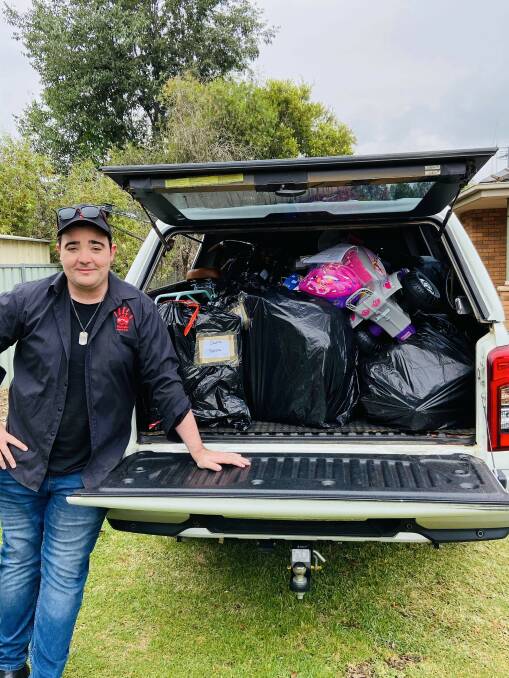 LOADED: In December Jason Owen took a 10 day roadt trip to deliver funds, Christmas gifts and groceries to 800 children at 21 schools in regional areas of the country. Photo: SUPPLIED