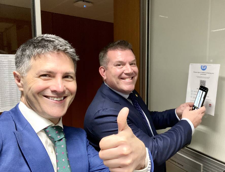 DIGITAL: Member for Dubbo Dugald Saunders digitally checks in to the office of Minister for Customer Service Victor Dominello. 