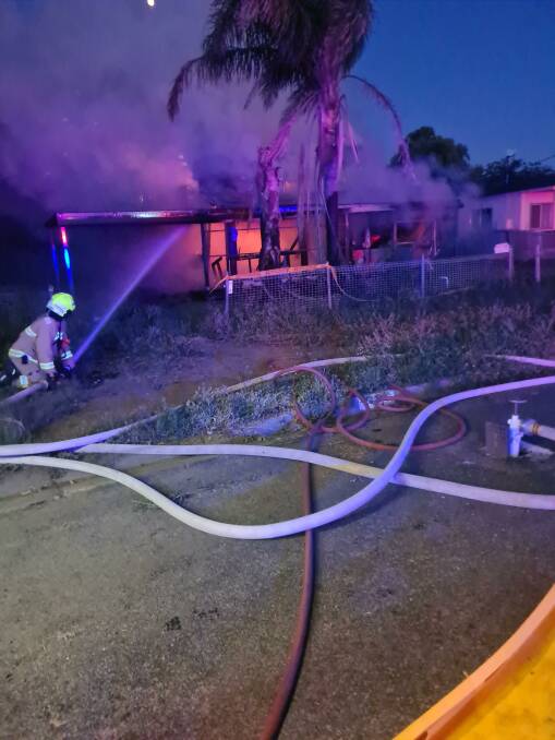 ROOF FIRE: Emergency services were called to the home in Coonamble on Monday morning. Photo: Fire and Rescue NSW