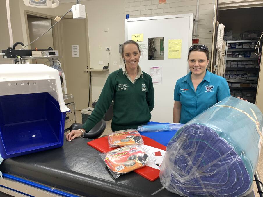 THANK YOU: The Zoo's Wildlife Hospital Vet Nurse Jo Milgate accepting the donation of goods from Sarah Trebely from Duncan McGinness Veterinary Surgery. 
