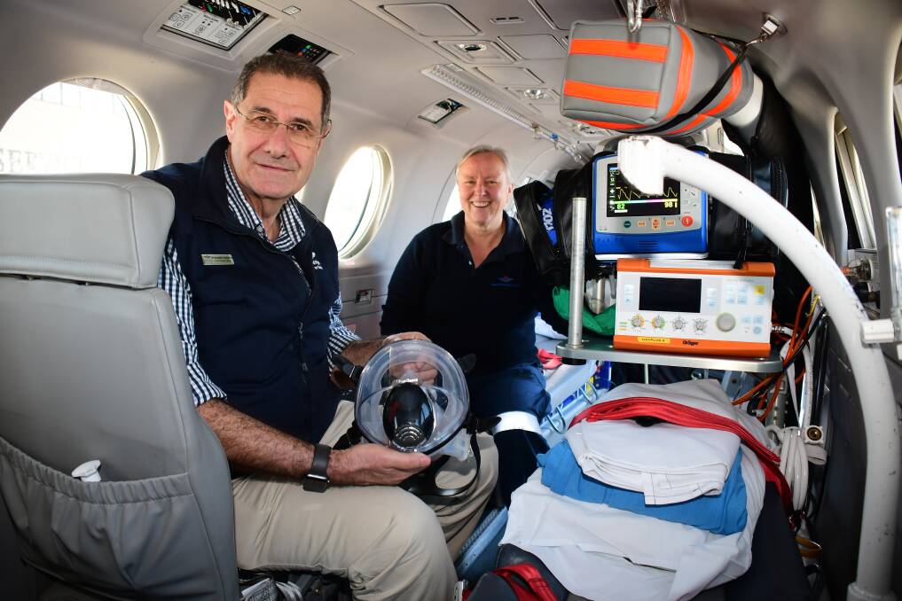IN THE AIR: RFDS NSW Chief Medical Officer Dr Randall Greenberg with Flight Nurse Susan Jamieson. Photo: BELINDA SOOLE