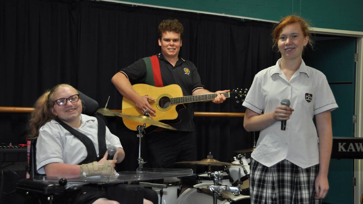 MAKING MUSIC: Dubbo College Senior Campus support unit students Codee Holmes and Jessica Quince, with Jackson Murray.
