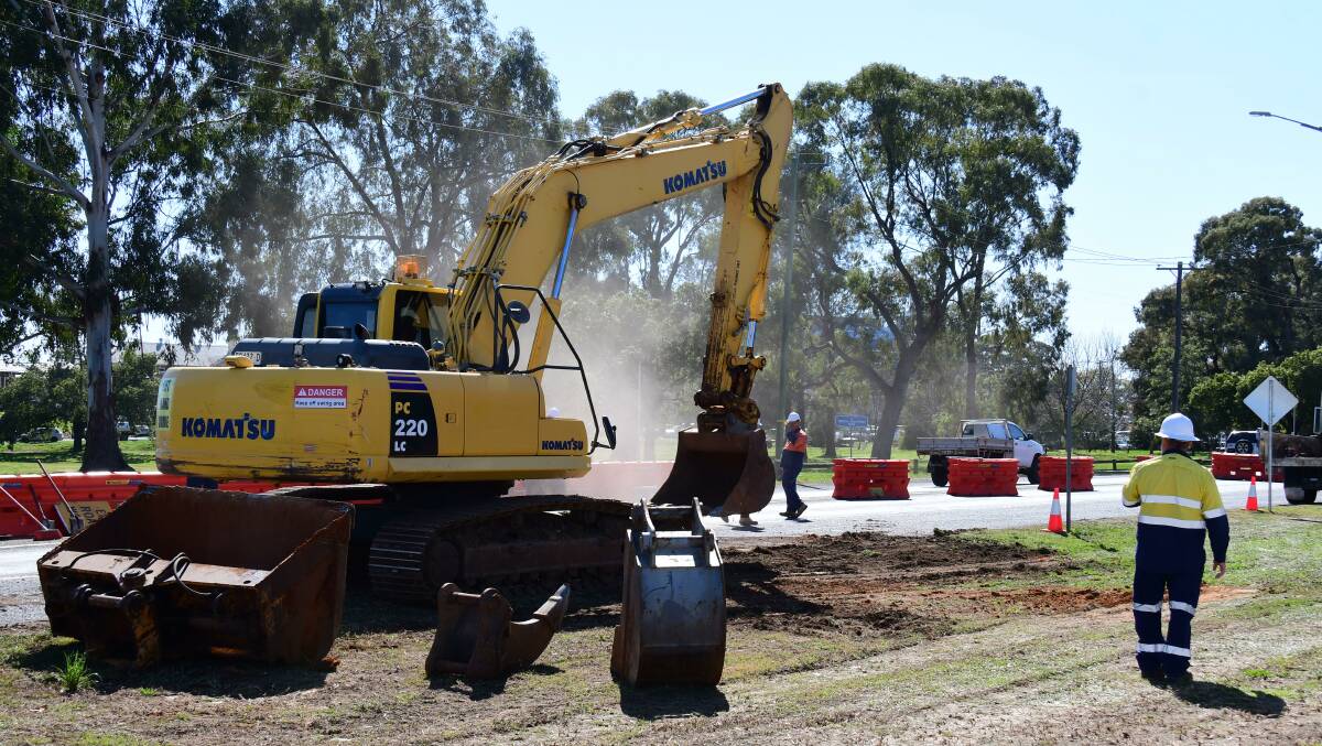 EMERGENCY roadworks are underway to repair a significant submerged hole covered by a thin layer of roadway near Dubbo Hospital. Photo: AMY MCINTYRE