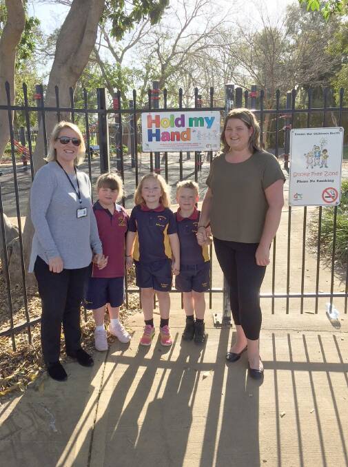 HOLD MY HAND: Dubbo Regional Council Road Safety Officer Jayne Bleechmore, Georgia Pilon, Harry Pilon, Michelle McHugh and Mum Nicole McHugh at the Victoria Park playground, Dubbo. Photo: CONTRIBUTED