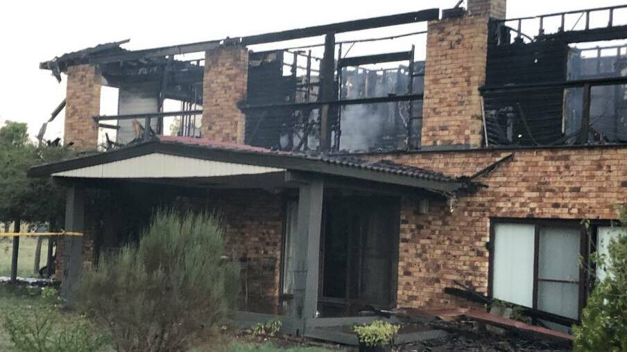 DESTROYED: The top storey of a family home on Rocky Waterhole Road was destroyed during an overnight fire. Photo: SUPPLIED