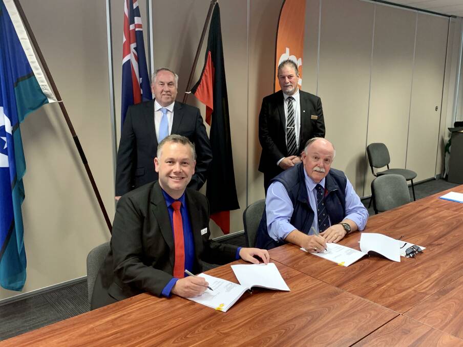 LAND SWAP: Dubbo mayor Ben Shields and Dubbo Regional Council CEO Michael McMahon with Dubbo RSL Club manager Gus Lico and president Jeff Caldbeck, signing the agreement. Photo: CONTRIBUTED